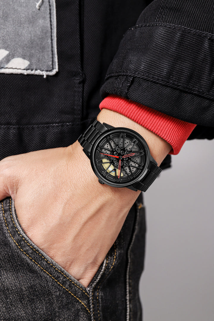 Babusar BMW M5 wheel watch automotive inspired timepiece wearing on wrist.